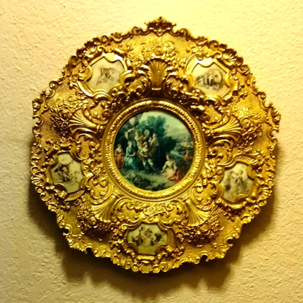 Gilt metal and porcelain rococo style registrado wall plaque measures 14" DIA